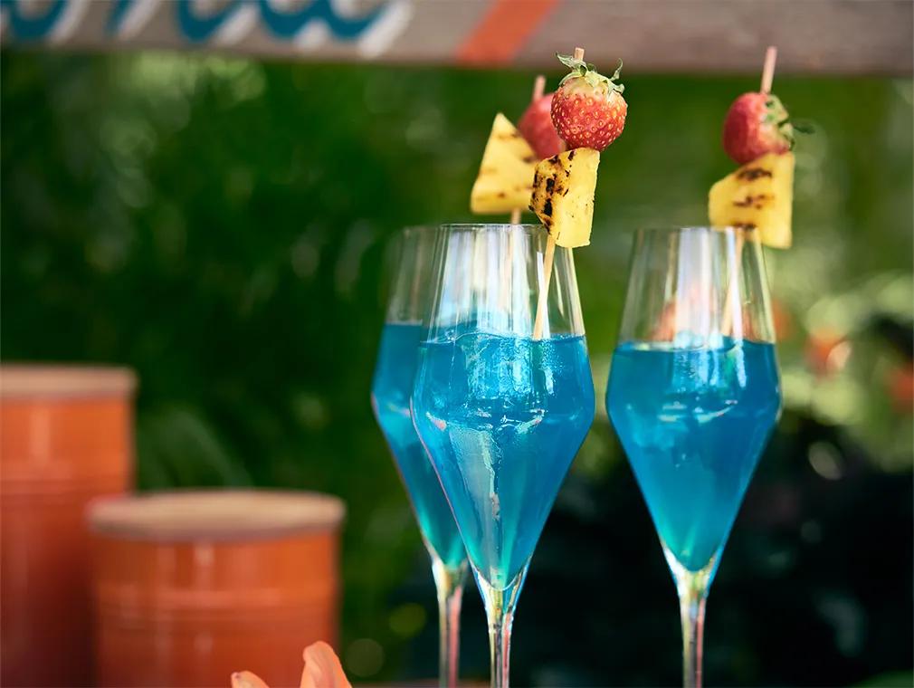 Blue Hawaiian Cocktail with Grilled Pineapple 